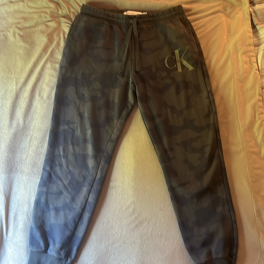 Camo gray Calvin Klein Sweats, they do have a little hole near the pocket area